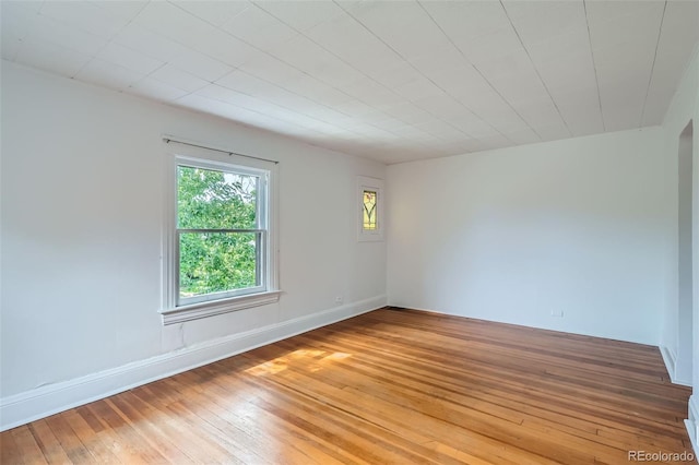 1654 S Pearl St, Denver, CO 80210 - unfurnished room featuring light wood-style floors