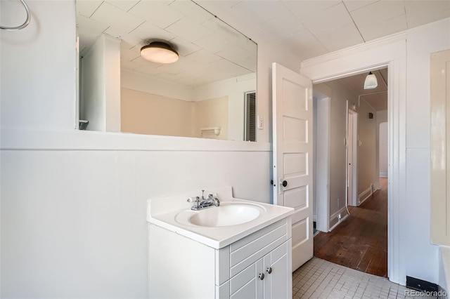 1654 S Pearl St, Denver, CO 80210 - bathroom with vanity and wood finished floors