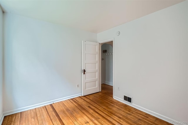 1654 S Pearl St, Denver, CO 80210 - unfurnished room with baseboards and light wood-style flooring
