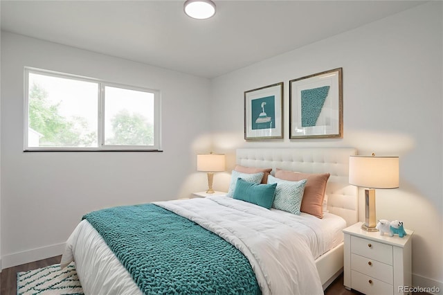 9008 Dover St, Broomfield, CO 80021 - bedroom featuring wood finished floors and baseboards