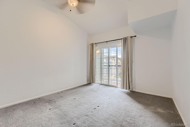 9180 Rolling Way Unit 303, Parker, CO 80134 - spare room with lofted ceiling, carpet, a ceiling fan, and baseboards