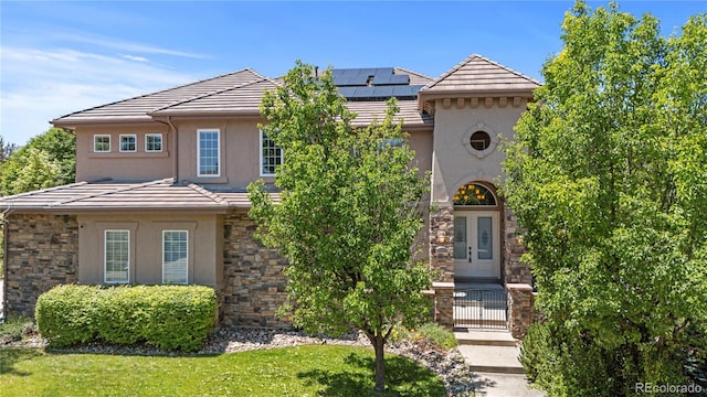 14325 N Santa Fe St, Broomfield, CO 80023 - view of front of property featuring stucco siding and a tiled roof