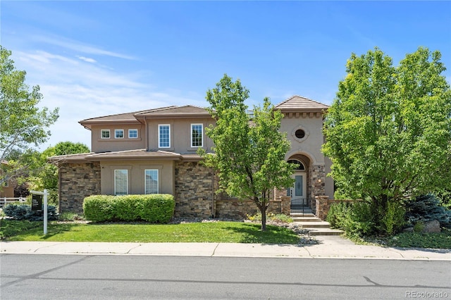 14325 N Santa Fe St, Broomfield, CO 80023 - view of front facade featuring stucco siding and stone siding