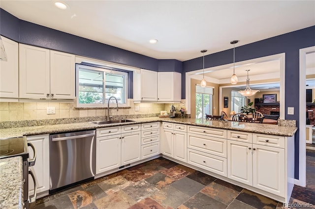 kitchen with stainless steel dishwasher, a sink, backsplash, electric stove, and recessed lighting
