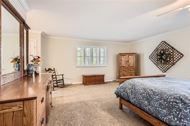 bedroom with ornamental molding, carpet floors, and baseboards