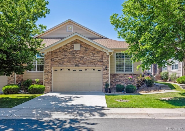 3742 E 127th Ln, Thornton, CO 80241 - view of front of house featuring stone siding, an attached garage, driveway, and roof with shingles