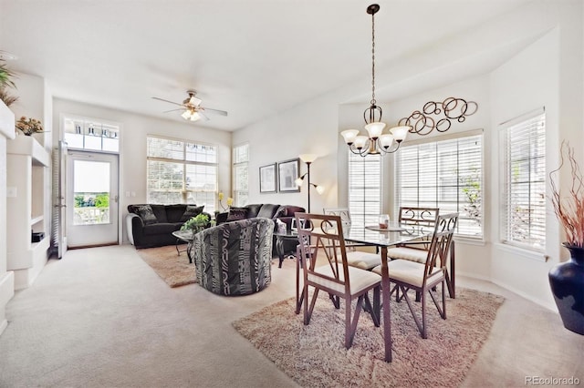 3742 E 127th Ln, Thornton, CO 80241 - dining room featuring carpet, a chandelier, and a ceiling fan
