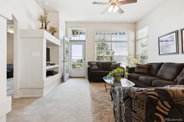3742 E 127th Ln, Thornton, CO 80241 - living room featuring carpet flooring, ceiling fan, and built in features