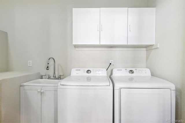3742 E 127th Ln, Thornton, CO 80241 - laundry area with washing machine and clothes dryer and cabinet space