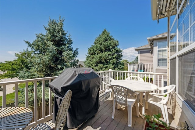 3742 E 127th Ln, Thornton, CO 80241 - wooden deck featuring area for grilling and outdoor dining area