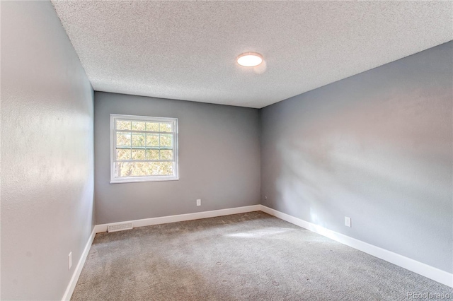 2790 S Wheeling Way, Aurora, CO 80014 - unfurnished room with carpet flooring and a textured ceiling