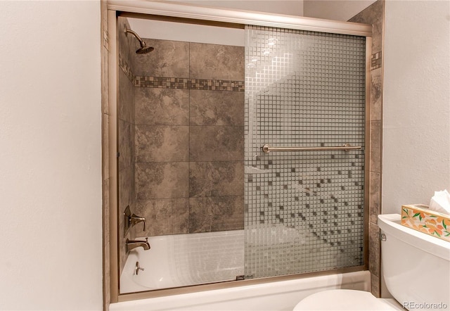 2790 S Wheeling Way, Aurora, CO 80014 - bathroom featuring combined bath / shower with glass door