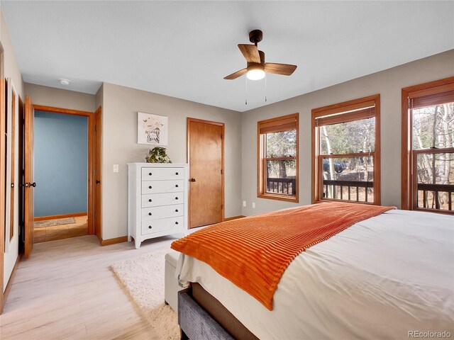 385 Pine Dr, Fairplay, CO 80440 - bedroom featuring light wood finished floors, baseboards, and ceiling fan