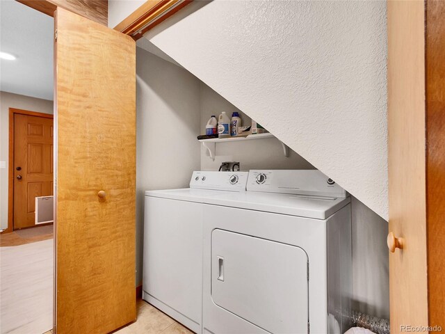 385 Pine Dr, Fairplay, CO 80440 - clothes washing area featuring laundry area and separate washer and dryer