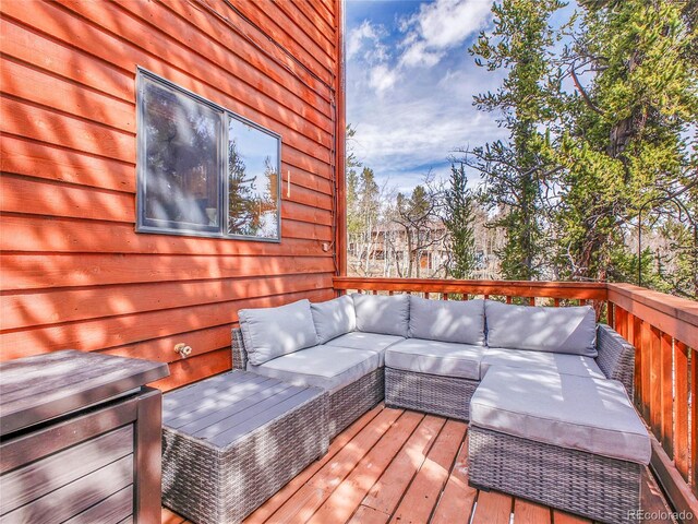 385 Pine Dr, Fairplay, CO 80440 - wooden terrace with an outdoor living space