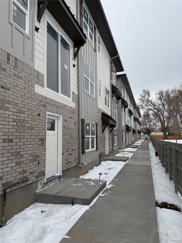 view of snow covered building