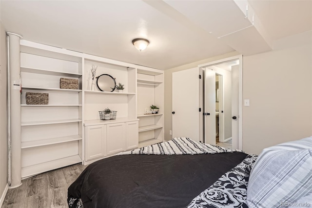 bedroom featuring hardwood / wood-style flooring