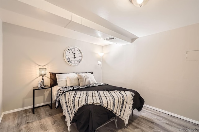 bedroom featuring hardwood / wood-style floors