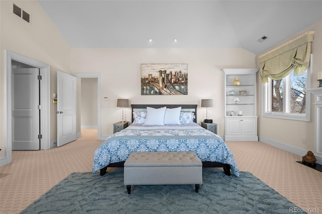 bedroom featuring vaulted ceiling and light carpet