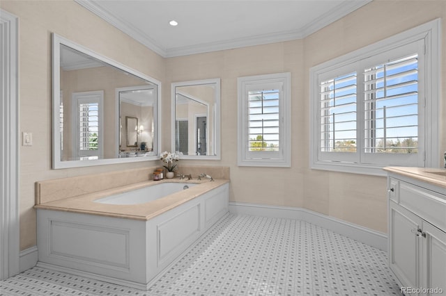 bathroom featuring vanity, a washtub, crown molding, and a healthy amount of sunlight