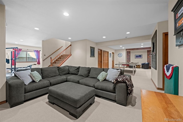 living room featuring light carpet