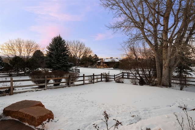 view of yard covered in snow