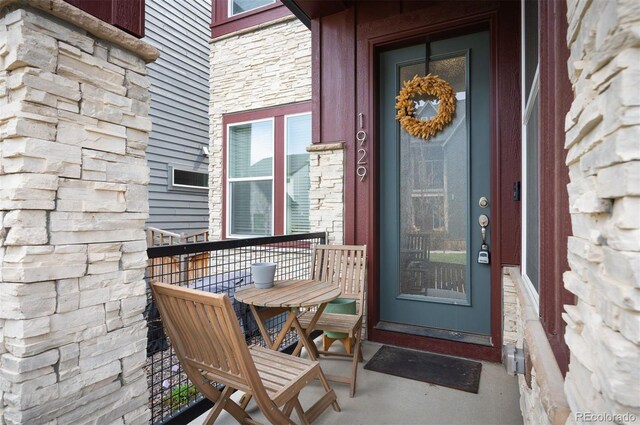 1929 W 165th Way, Broomfield, CO 80023 - entrance to property with stone siding and a porch