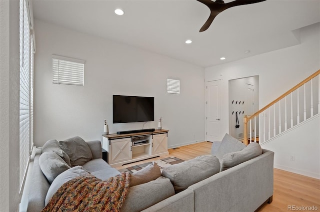 1929 W 165th Way, Broomfield, CO 80023 - living area with a ceiling fan, light wood-style flooring, recessed lighting, stairs, and baseboards