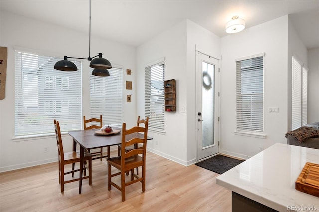 1929 W 165th Way, Broomfield, CO 80023 - dining area featuring light wood-style flooring and baseboards