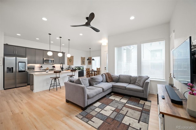1929 W 165th Way, Broomfield, CO 80023 - living area with light wood-type flooring, recessed lighting, and ceiling fan