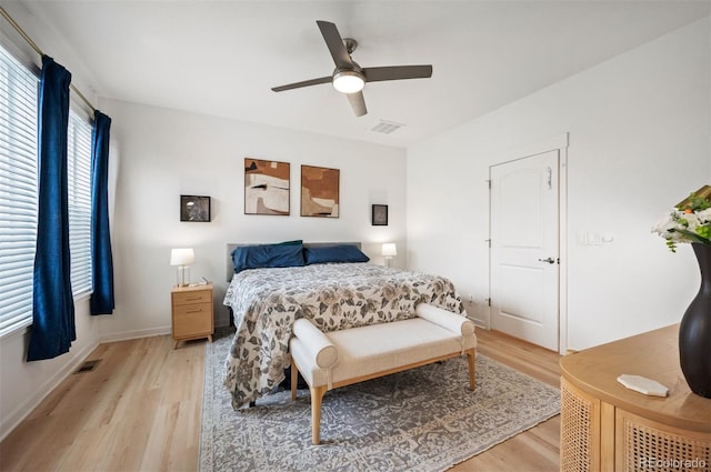 1929 W 165th Way, Broomfield, CO 80023 - bedroom with light wood-type flooring, ceiling fan, and baseboards