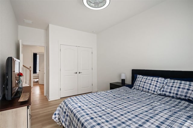 1929 W 165th Way, Broomfield, CO 80023 - bedroom with light wood finished floors and a closet