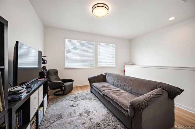 1929 W 165th Way, Broomfield, CO 80023 - living room featuring healthy amount of natural light, wood finished floors, and baseboards