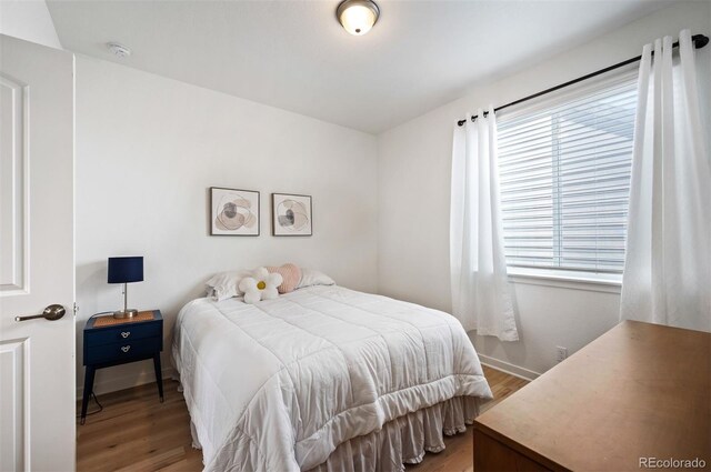 1929 W 165th Way, Broomfield, CO 80023 - bedroom with wood finished floors and baseboards