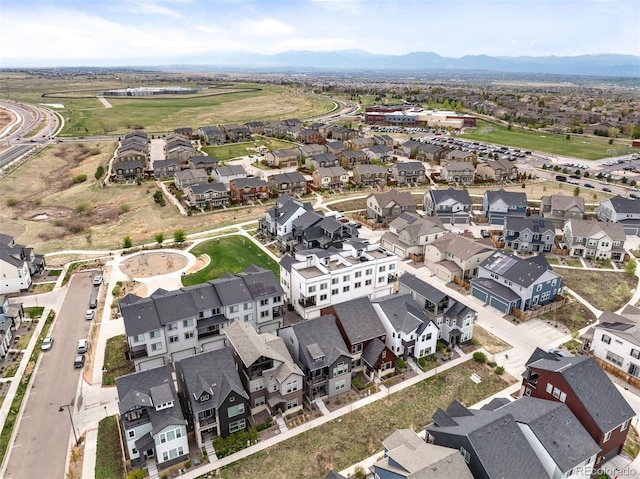 1929 W 165th Way, Broomfield, CO 80023 - aerial view of property and surrounding area featuring nearby suburban area and a mountain backdrop