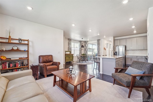 living room with light hardwood / wood-style flooring