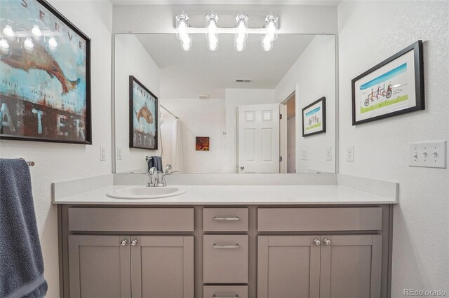 bathroom featuring vanity