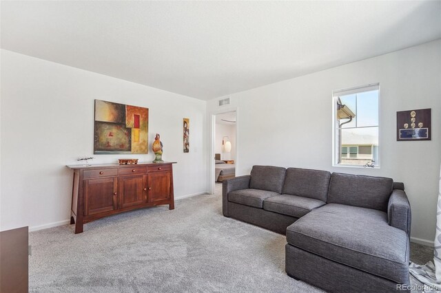 living room with light colored carpet