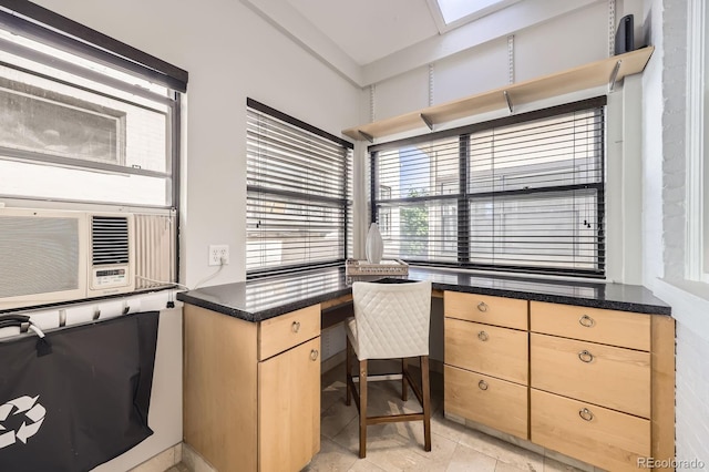 office featuring built in study area and cooling unit