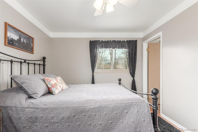 6905 Nelson St, Arvada, CO 80004 - carpeted bedroom featuring a ceiling fan, baseboards, and ornamental molding