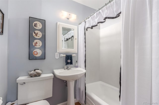 6905 Nelson St, Arvada, CO 80004 - full bath featuring shower / bathtub combination with curtain and toilet