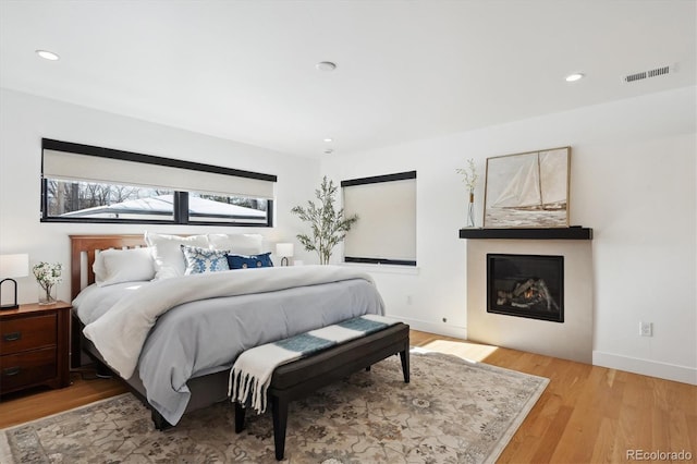 bedroom featuring light hardwood / wood-style floors