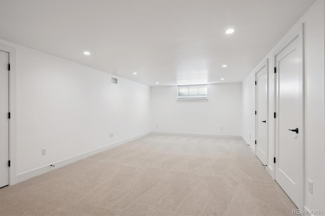 basement with light colored carpet