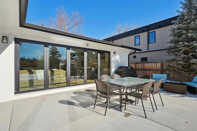 view of patio with a grill