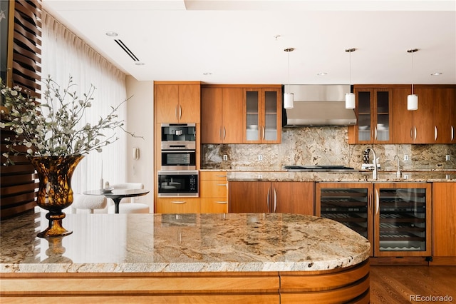1133 14th St Unit 3420, Denver, CO 80202 - kitchen featuring wall chimney exhaust hood, wine cooler, stainless steel appliances, and brown cabinets