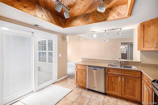 kitchen with wood ceiling, visible vents, stainless steel appliances, and a sink