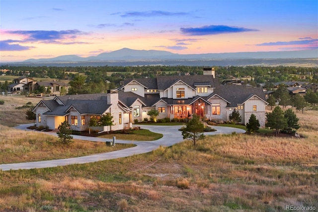 modern inspired farmhouse with a mountain view