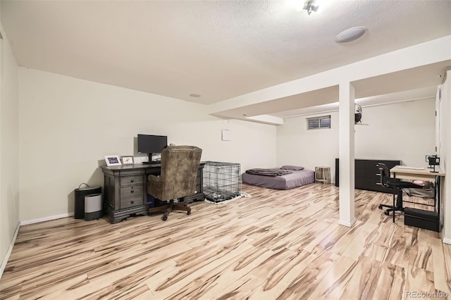 14742 E Radcliff Pl, Aurora, CO 80015 - office space with wood finished floors, baseboards, and a textured ceiling