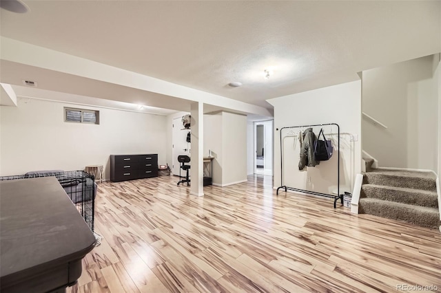 14742 E Radcliff Pl, Aurora, CO 80015 - living area with light wood-style flooring, stairway, and baseboards