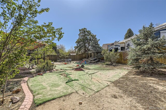 14742 E Radcliff Pl, Aurora, CO 80015 - fenced backyard with a patio